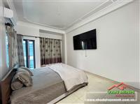 Bán nhà 4 tầng mặt đường Trần Bích - Đường trước mặt 10m